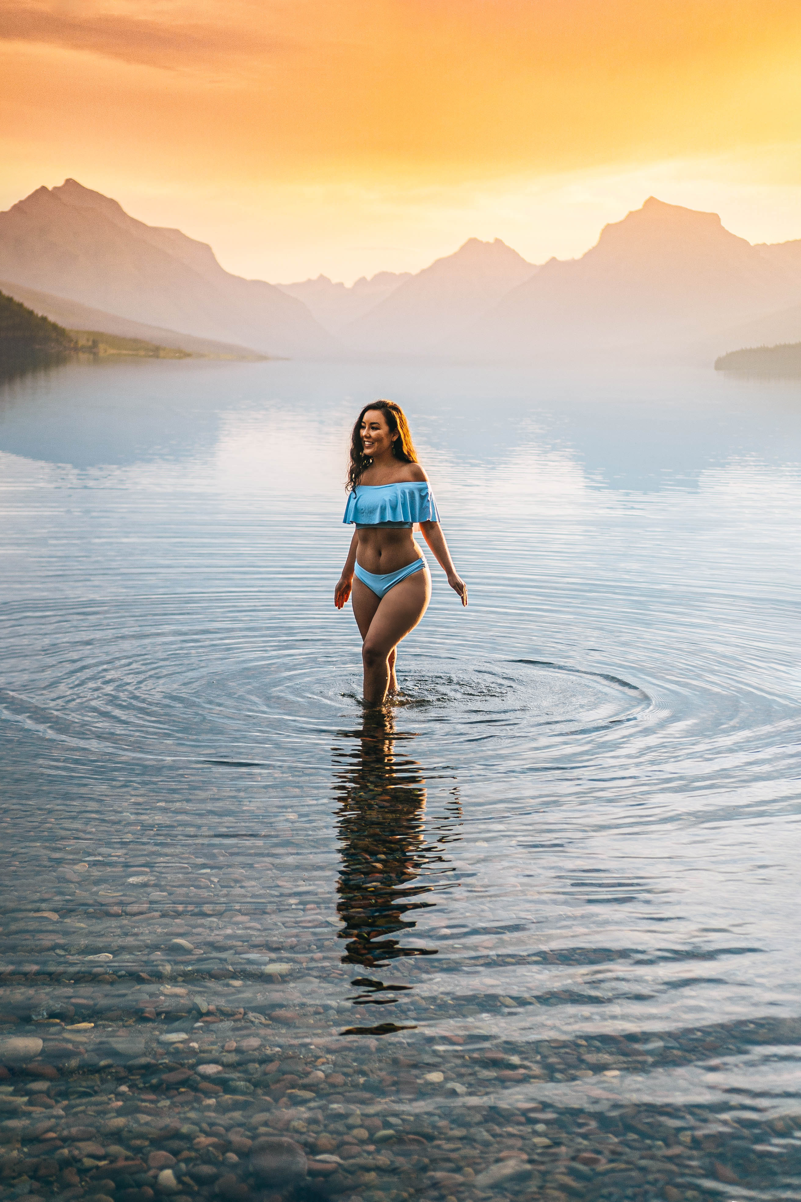 sunrise swim at lake mcdonald in glacier national park