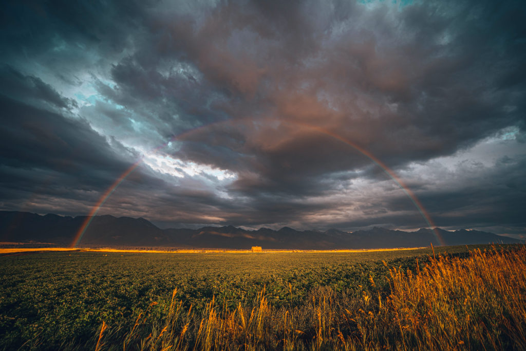 rainbow over ronin barn in montana